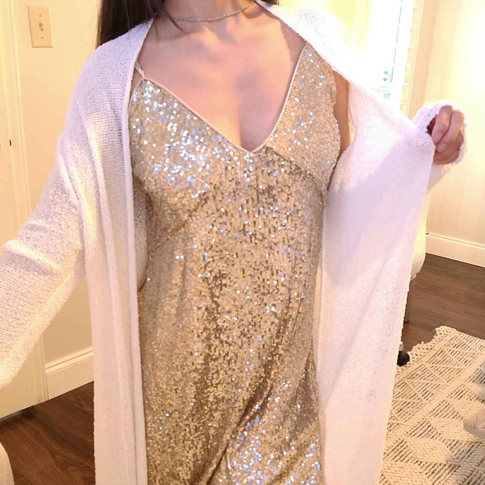 Miami Gold Sequin Dress With White Cardigan.